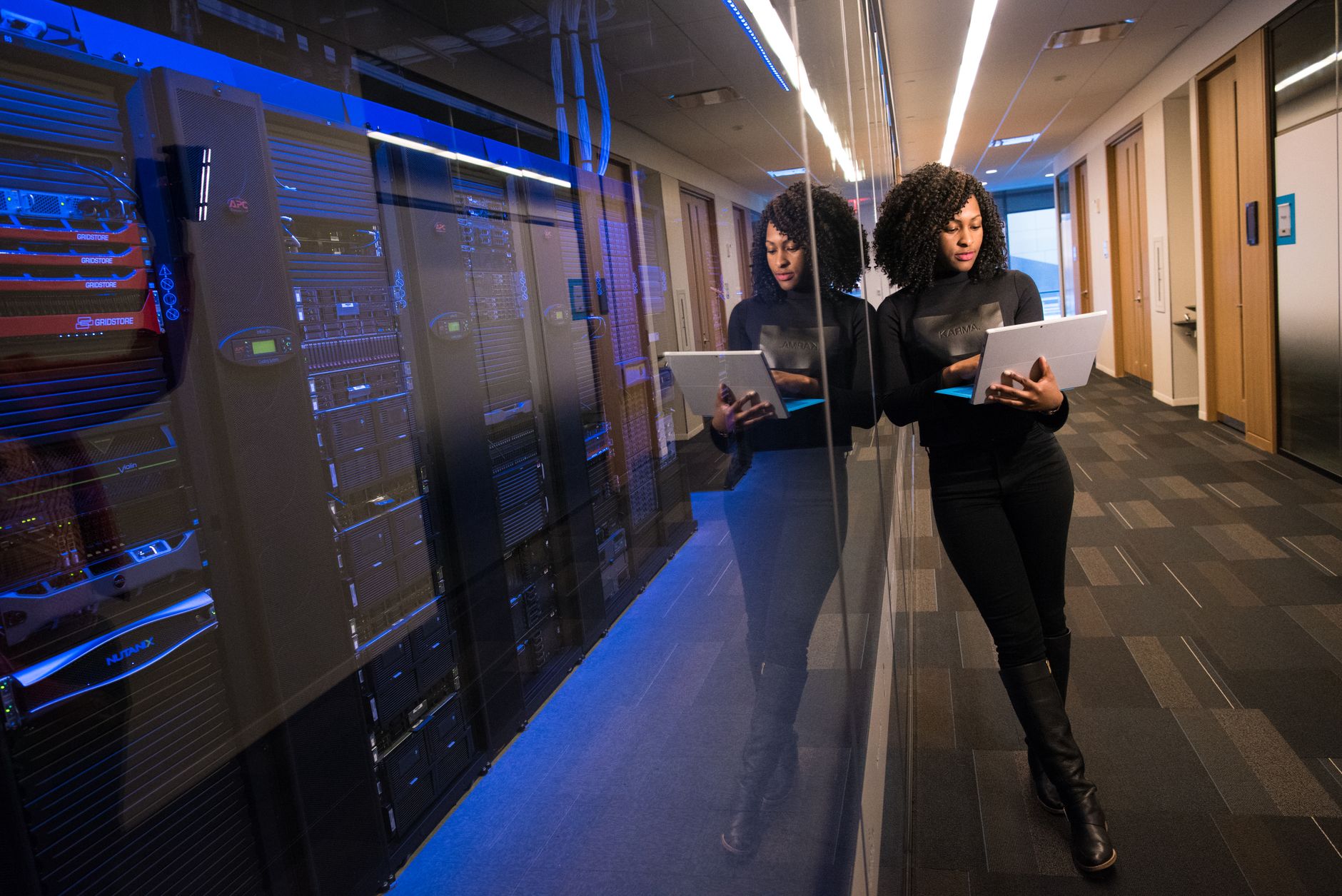 Server racks in a data center, representing AI compute infrastructure